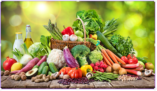 A variety of fresh fruits and vegetables displayed on a wooden table, symbolizing the role of diet and nutrition in managing COPD