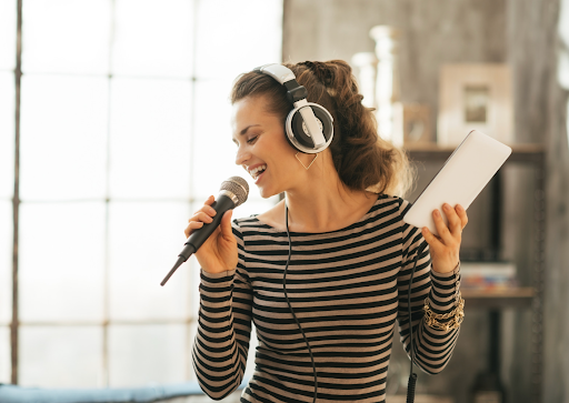 Woman engaged in music therapy, showing the positive impact of creativity on mental health in COPD management.