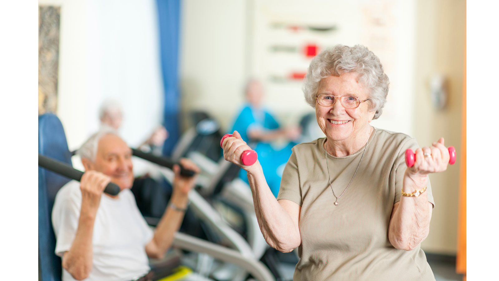 Smiling elderly woman lifting dumbbells in a fitness class for seniors.