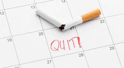 Symbolic image of quitting smoking, with a broken cigarette on a calendar marked 'Quit!'